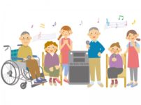 デイサービスのカラオケで盛り上がる高齢者と介護職員